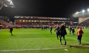 Manchester United hit with a UEFA charge for “field invasion”