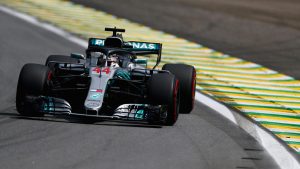 Lewis Hamilton beat Ferrari’s Sebastian Vettel to secure pole position at the Brazilian Grand Prix