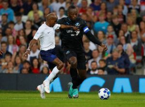 Usain Bolt scores penalty at Old Trafford in Soccer Aid charity match