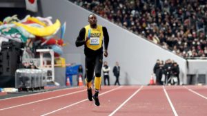 Usain Bolt runs on the track at Tokyo’s newly-completed National Stadium