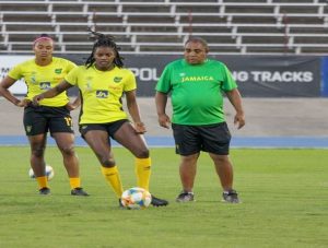 Reggae girls coach Hue Menzies puts a positive spin on the happenings in Glasgow