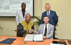 Grange welcomes MOU on reparatory justice academic programme between UWI and UOG